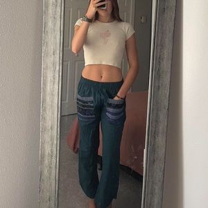 blue linen pants with funky print pockets